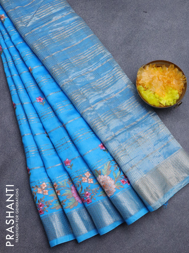 Assam silk saree blue with allover zari weaves & embroidery work buttas and floral design embroidery work zari border