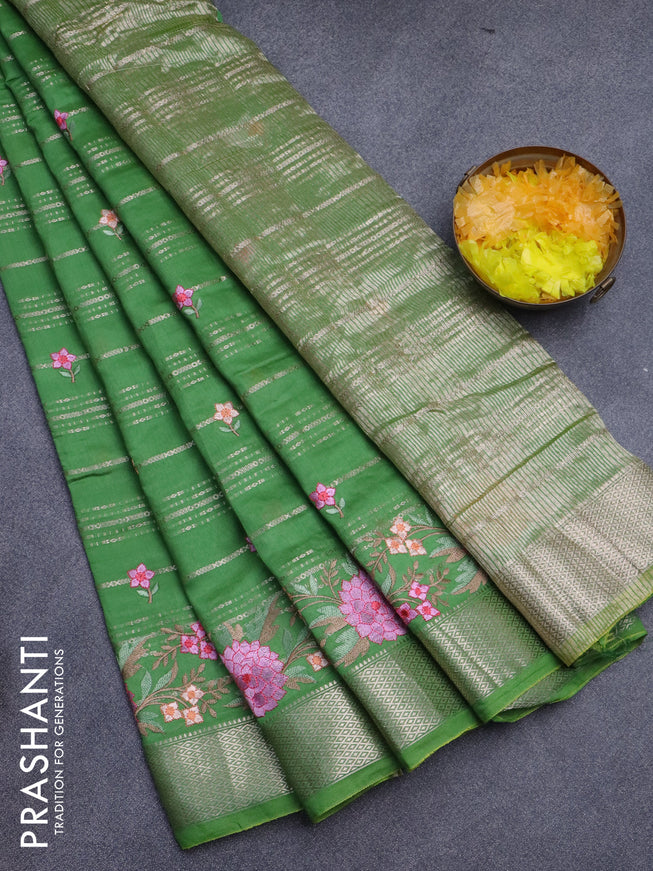 Assam silk saree green with allover zari weaves & embroidery work buttas and floral design embroidery work zari border