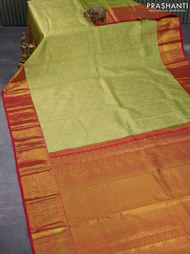 Pure kanchipuram silk saree pista green and maroon with allover zari woven brocade weaves and zari woven border & aari work blouse