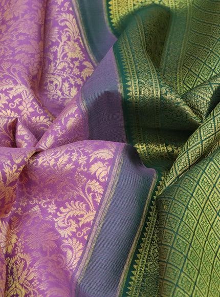 Pure kanchipuram silk saree mild purple and green with allover zari woven brocade weaves and long zari woven border & aari work blouse