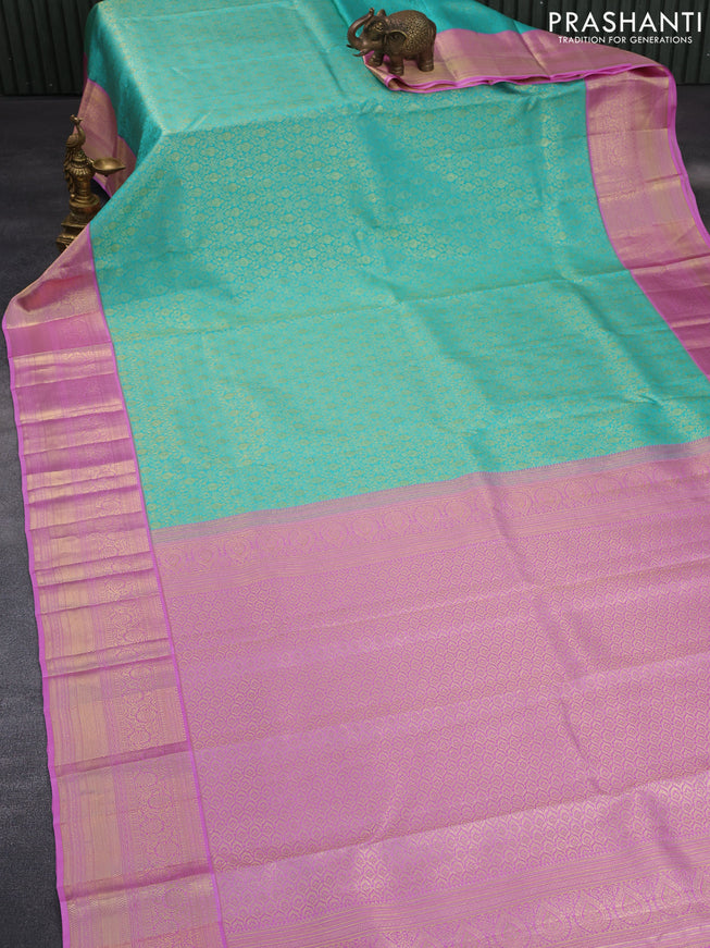 Pure kanchipuram silk saree teal blue shade and light pink with allover zari woven brocade weaves and zari woven border & aari work blouse