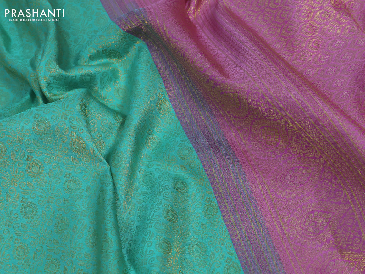 Pure kanchipuram silk saree teal blue shade and light pink with allover zari woven brocade weaves and zari woven border & aari work blouse