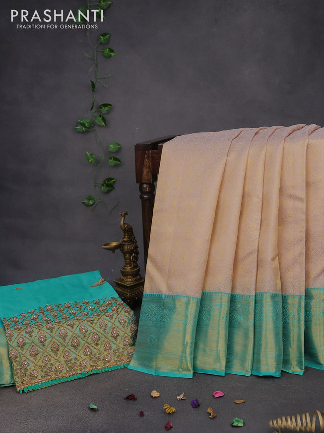 Pure kanchipuram silk saree pastel pink and teal blue with allover zari woven brocade weaves and zari woven border & aari work blouse