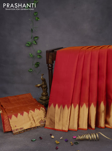 Pure kanchipuram silk saree dual shade of pinkish orange with plain body and temple deisgn zari woven border & aari work blouse