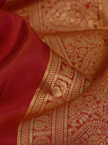 Pure kanchipuram silk saree dual shade of pinkish orange with plain body and temple deisgn zari woven border & aari work blouse