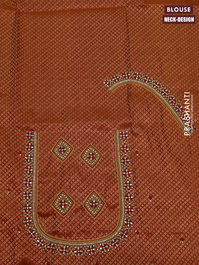 Pure kanchipuram silk saree dual shade of pinkish orange with plain body and temple deisgn zari woven border & aari work blouse