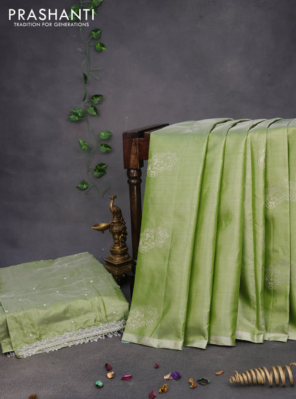 Pure kanchipuram tissue silk saree green shade with silver zari woven buttas in borderless style & aari work blouse