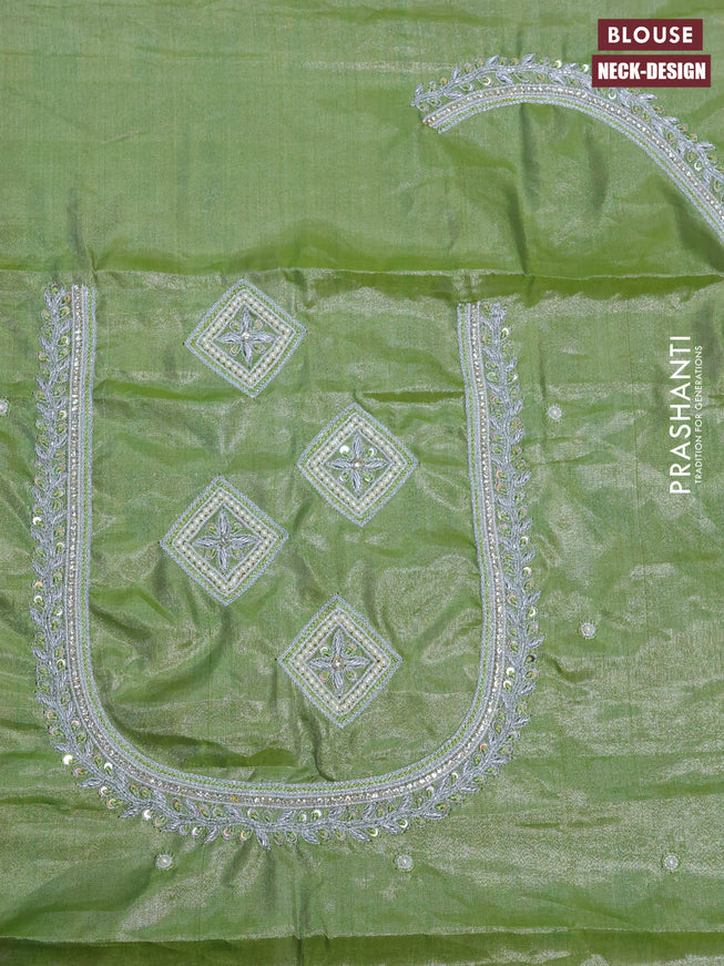 Pure kanchipuram tissue silk saree green shade with silver zari woven buttas in borderless style & aari work blouse