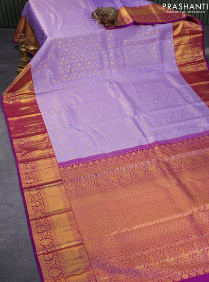 Pure kanchipuram silk saree lavender shade and purple with allover zari woven brocade weaves and long zari woven border & aari work blouse