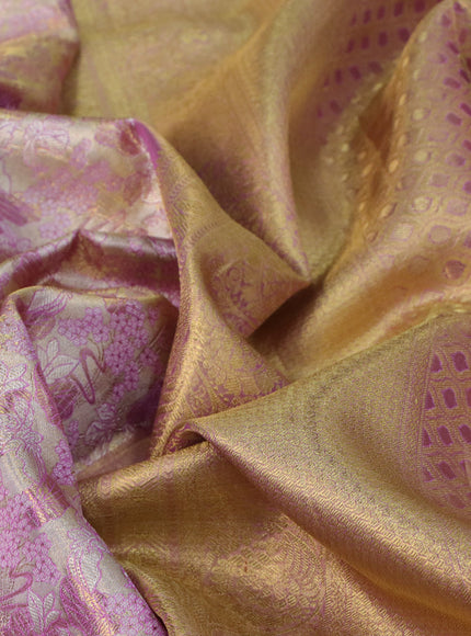 Pure kanchipuram silk saree gold and lavender shade with allover zari woven brocade weaves and long zari woven border & aari work blouse