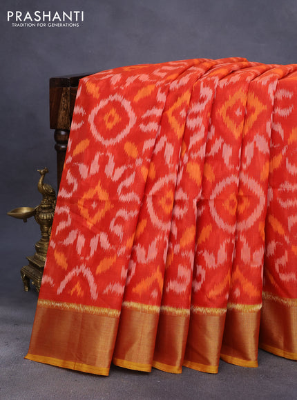 Ikat silk cotton saree orange and mustard yellow with allover ikat weaves and zari woven border