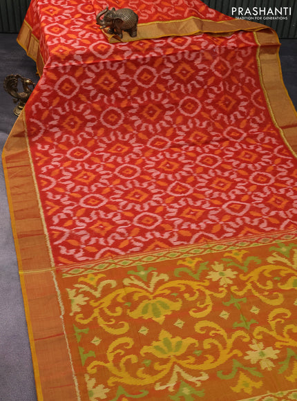 Ikat silk cotton saree orange and mustard yellow with allover ikat weaves and zari woven border