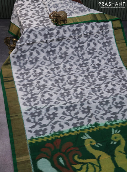 Ikat silk cotton saree off white grey and green with allover ikat weaves and zari woven border