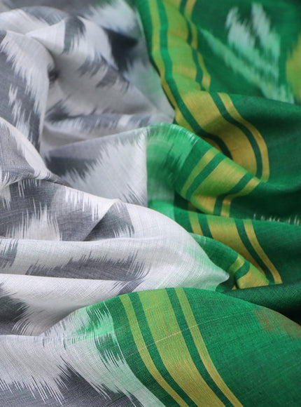 Ikat silk cotton saree off white grey and green with allover ikat weaves and zari woven border