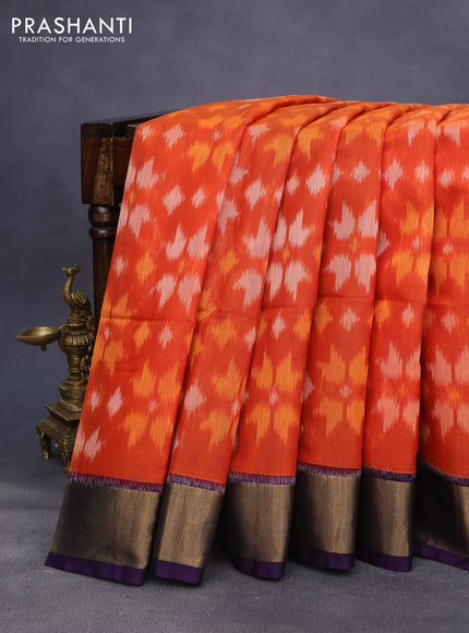 Ikat silk cotton saree orange and deep violet with allover ikat weaves and zari woven border