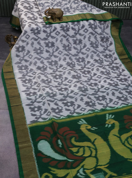 Ikat silk cotton saree off white grey and green with allover ikat weaves and zari woven border