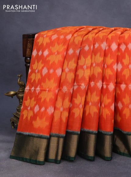 Ikat silk cotton saree orange and green with allover ikat weaves and zari woven border