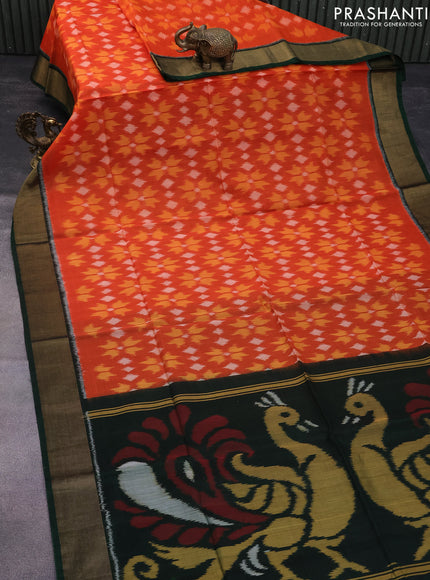 Ikat silk cotton saree orange and green with allover ikat weaves and zari woven border