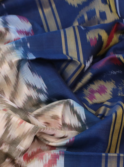 Ikat silk cotton saree cream and peacock blue with allover ikat weaves and zari woven border