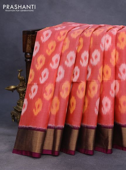 Ikat silk cotton saree peach orange and magenta pink with allover ikat weaves and zari woven border