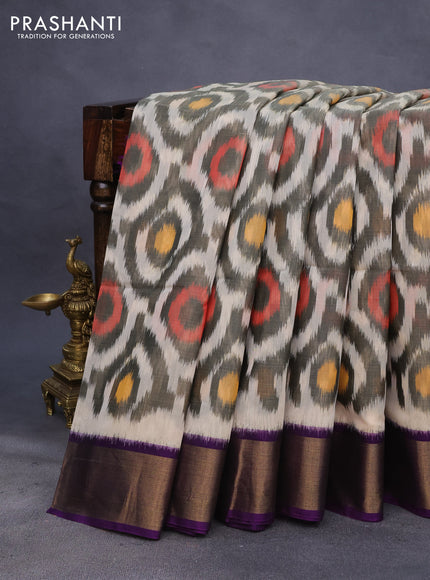 Ikat silk cotton saree grey and violet with allover ikat weaves and zari woven border