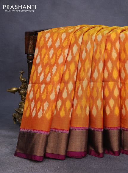 Ikat silk cotton saree mustard yellow and magenta pink with allover ikat weaves and zari woven border