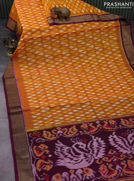 Ikat silk cotton saree mustard yellow and magenta pink with allover ikat weaves and zari woven border