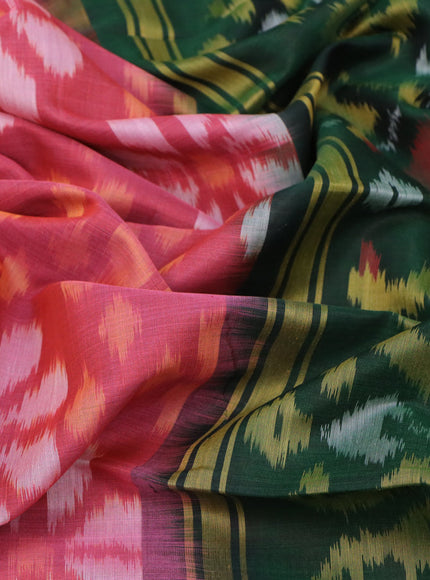 Ikat silk cotton saree pink shade and green with allover ikat weaves and zari woven border