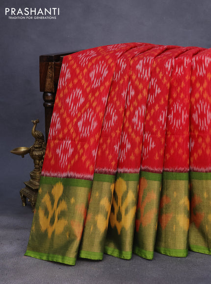 Ikat silk cotton saree red and light green with allover ikat weaves and long ikat woven zari border