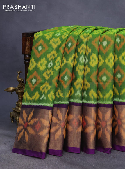 Ikat silk cotton saree green and violet with allover ikat weaves and long ikat woven zari border