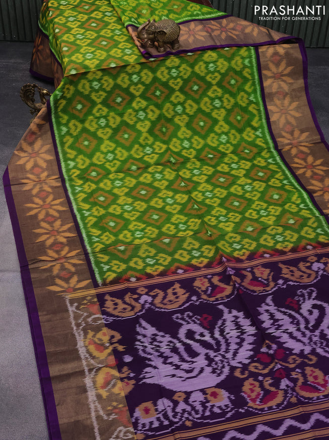 Ikat silk cotton saree green and violet with allover ikat weaves and long ikat woven zari border