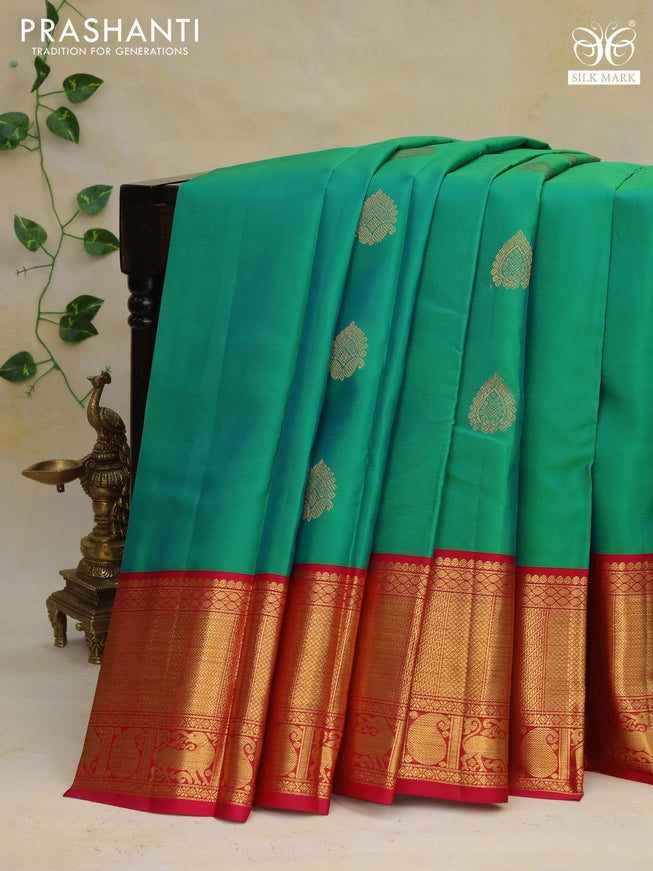 Pure kanchipuram silk saree dual shade of teal green and pink with zari woven buttas and zari woven korvai border