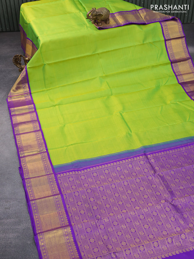 Pure kanchipuram silk saree light green and violet with plain body and zari woven korvai border