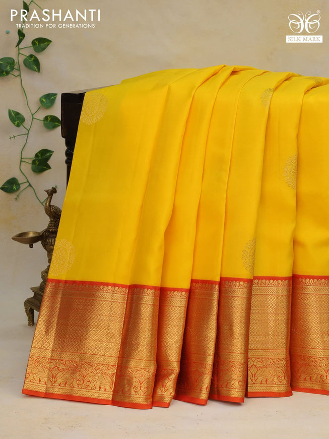 Pure kanchipuram silk saree yellow and orange with zari woven buttas and zari woven korvai border