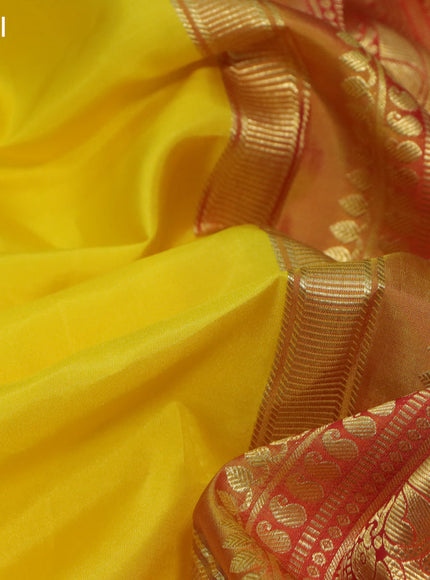 Pure kanchipuram silk saree yellow and orange with zari woven buttas and zari woven korvai border