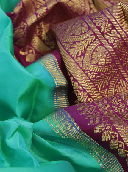 Pure kanchipuram silk saree teal blue shade and magenta pink with paisley zari woven buttas and zari woven korvai border