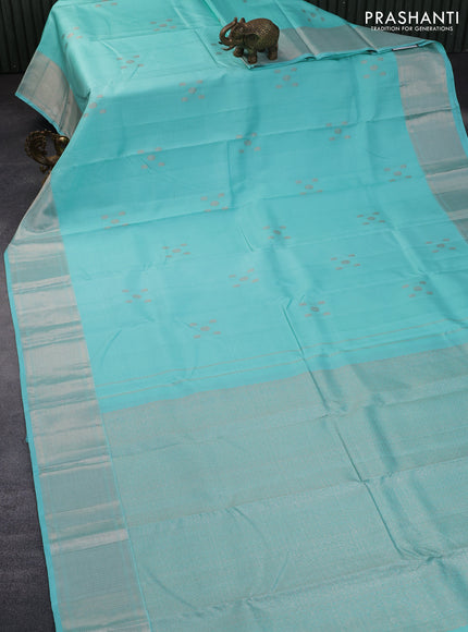 Pure kanchipuram silk saree teal blue shade with allover self emboss & silver zari buttas and silver zari woven border