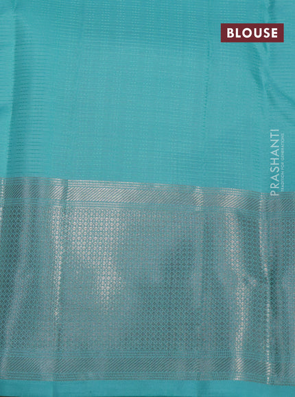 Pure kanchipuram silk saree teal blue shade with allover self emboss & silver zari buttas and silver zari woven border