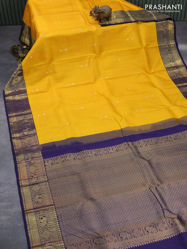 Pure kanchipuram silk saree mango yellow and blue with zari woven buttas and zari woven korvai border