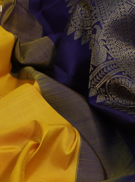 Pure kanchipuram silk saree mango yellow and blue with zari woven buttas and zari woven korvai border