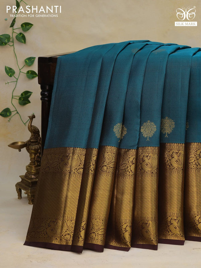 Pure kanchipuram silk saree cs blue and coffee brown with allover zari weaves & buttas and long rich zari woven border