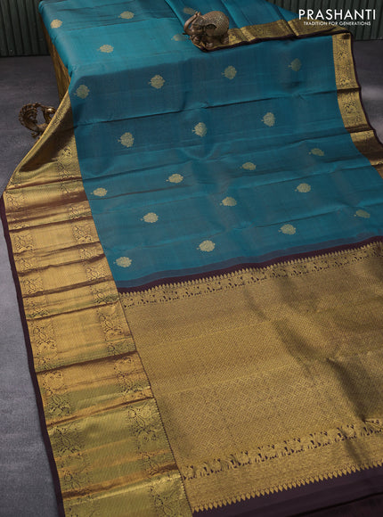 Pure kanchipuram silk saree cs blue and coffee brown with allover zari weaves & buttas and long rich zari woven border