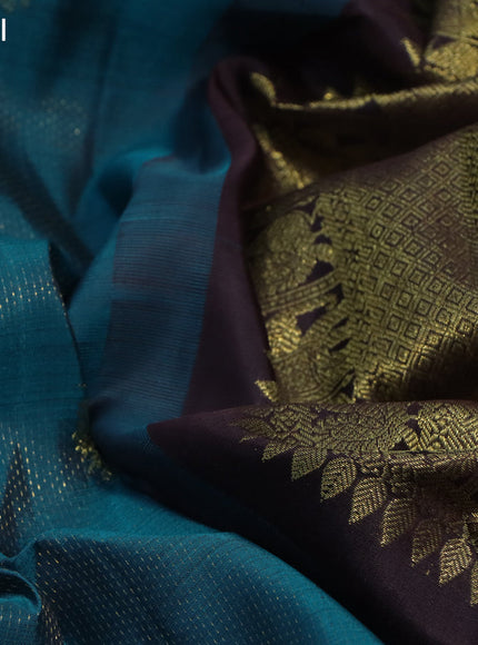 Pure kanchipuram silk saree cs blue and coffee brown with allover zari weaves & buttas and long rich zari woven border