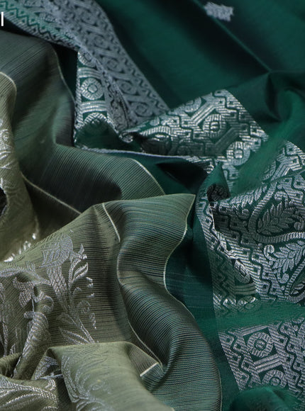 Pure kanchipuram silk saree green shade and dark green with allover silver zari woven brocade weaves and silver zari woven butta border