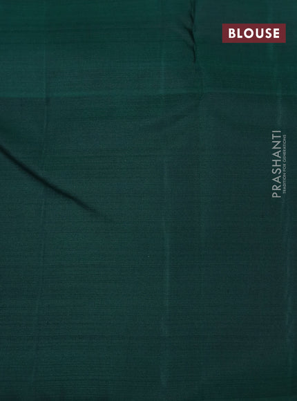 Pure kanchipuram silk saree green shade and dark green with allover silver zari woven brocade weaves and silver zari woven butta border