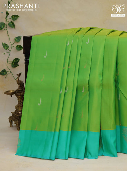 Pure kanchipuram silk saree light green and teal green with zari woven buttas and silver zari woven butta border