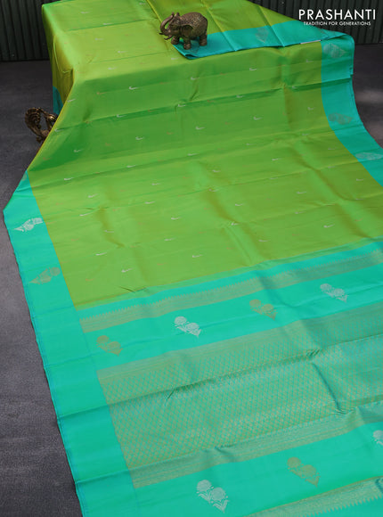 Pure kanchipuram silk saree light green and teal green with zari woven buttas and silver zari woven butta border