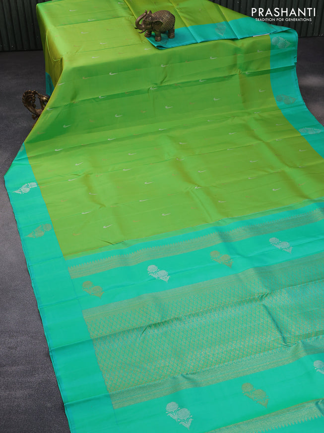 Pure kanchipuram silk saree light green and teal green with zari woven buttas and silver zari woven butta border