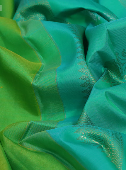 Pure kanchipuram silk saree light green and teal green with zari woven buttas and silver zari woven butta border