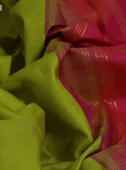 Pure kanchipuram silk saree lime green and dual shade of pinkish orange with plain body and zari woven simple border